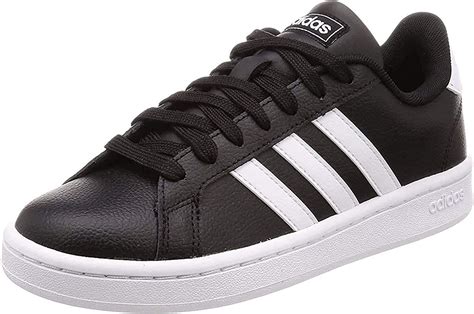 schwarze adidas schuhe mit weißen punkten|Schwarze Schuhe .